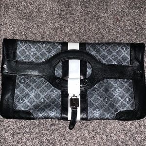 L.A.M.B by Gwen Stefani clutch